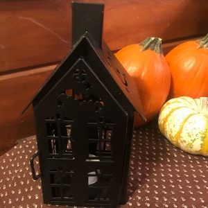 Black haunted house tea light